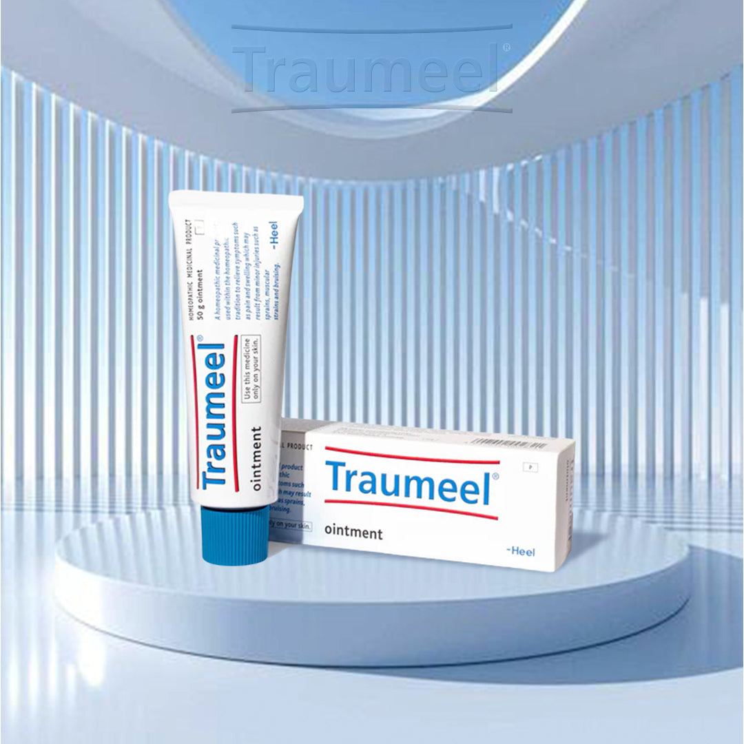 Heel Traumeel ointment tube for pain relief, featuring a white and green design, used for health care and inflammation reduction.